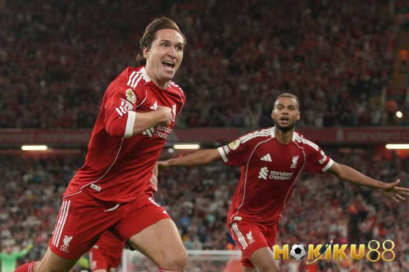 "Pemain Liverpool merayakan gol di Anfield saat pertandingan Liga Champions 2024, suasana penuh semangat dengan dukungan suporter."